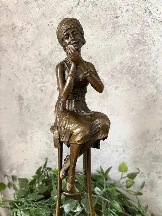 Decorative ornament - Europe - Bronze lady on a stool