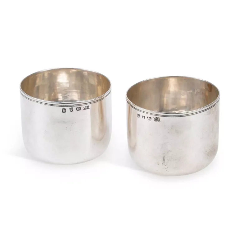 A Pair Of George III Silver Tumblers by Charles Hougham, London 1765, of plain circular form with a reeled rim