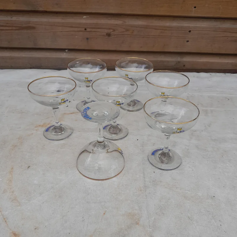 Set of seven vintage Babycham advertising glasses