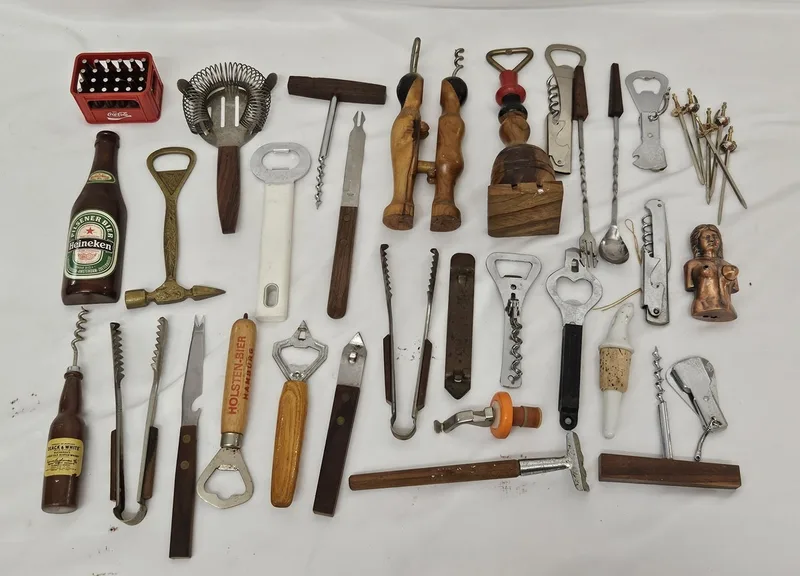Vintage Bottle Openers & bar tools, incl. comical, Heineken, Ice scoop, Buchanans bottle opener, whisk etc
