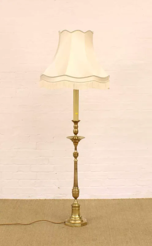 A Brass Standard Lamp in the Form of a Victorian Candlestick A Brass Standard Lamp in the Form of a Victorian Candlestick