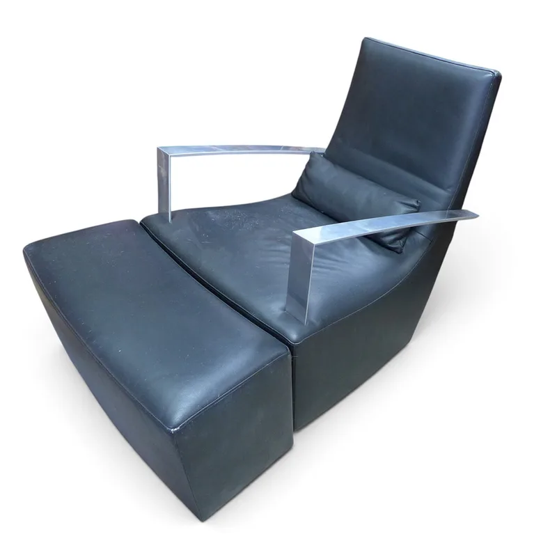 A Ligne Roset Neo Rocking Chair and Footstool