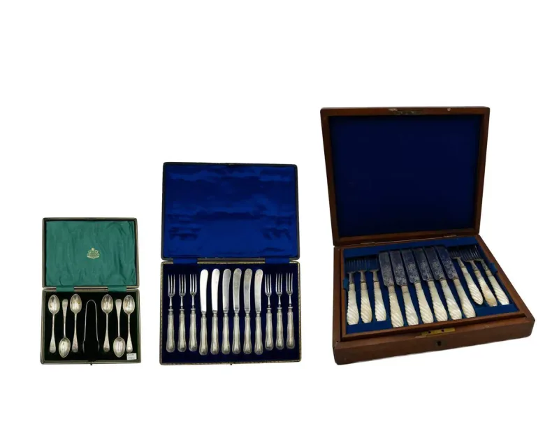 A cased set of silver teaspoons and sugar tongs by Barker Brothers