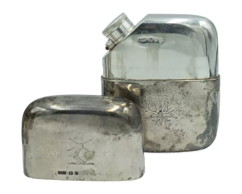 A Victorian silver hip flask by Cohen & Charles