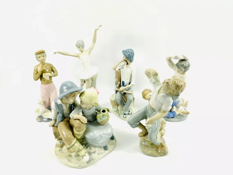A collection of six various Lladro style porcelain figurines, various marks to the undersides. 12cms wide x 13cms deep x 32.5cms high (Ballerina)