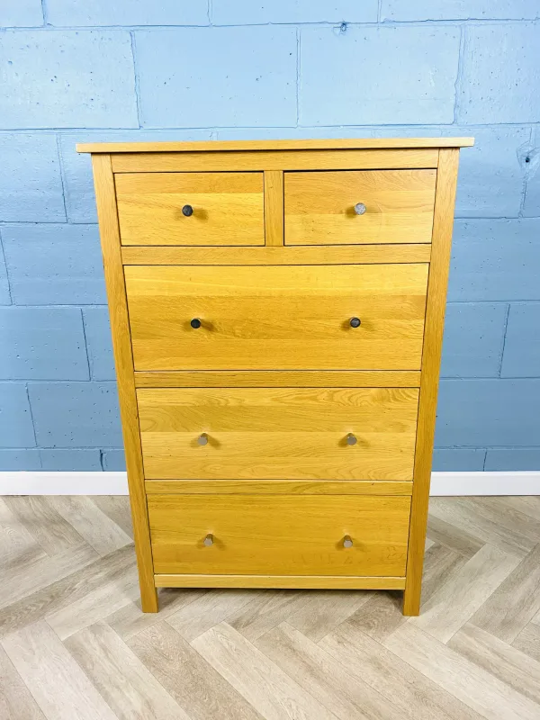 One of a pair, a good quality contemporary solid oak chest of drawers