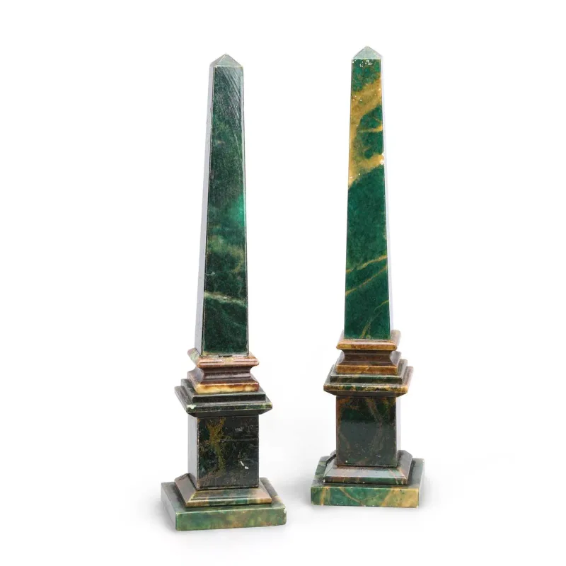 A Pair Of Simulated Marble Obelisks 20th Century, each of tapering square section with a pyramidal cap