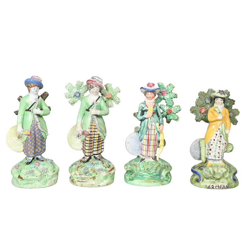 Four 19th Century Staffordshire Pottery Figures of Archers (4)
