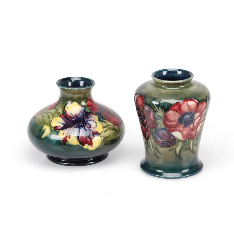 A Moorcroft 'Anemone' Vase And A 'Hibiscus' Vase comprising the first of inverted baluster form on a spreading foot