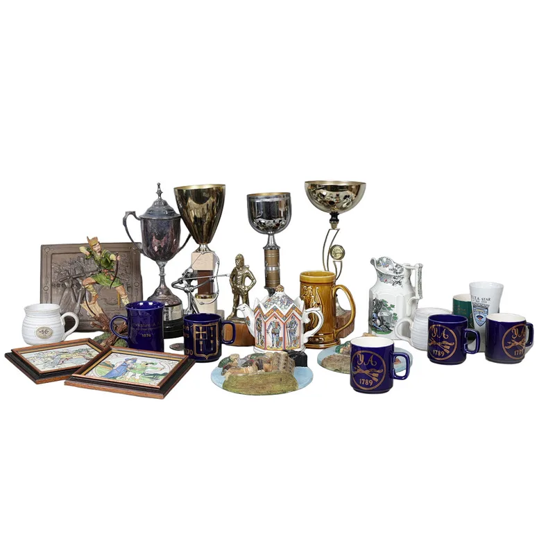 A Collection of Archery Related Ceramics and Three Trophies (Qty)