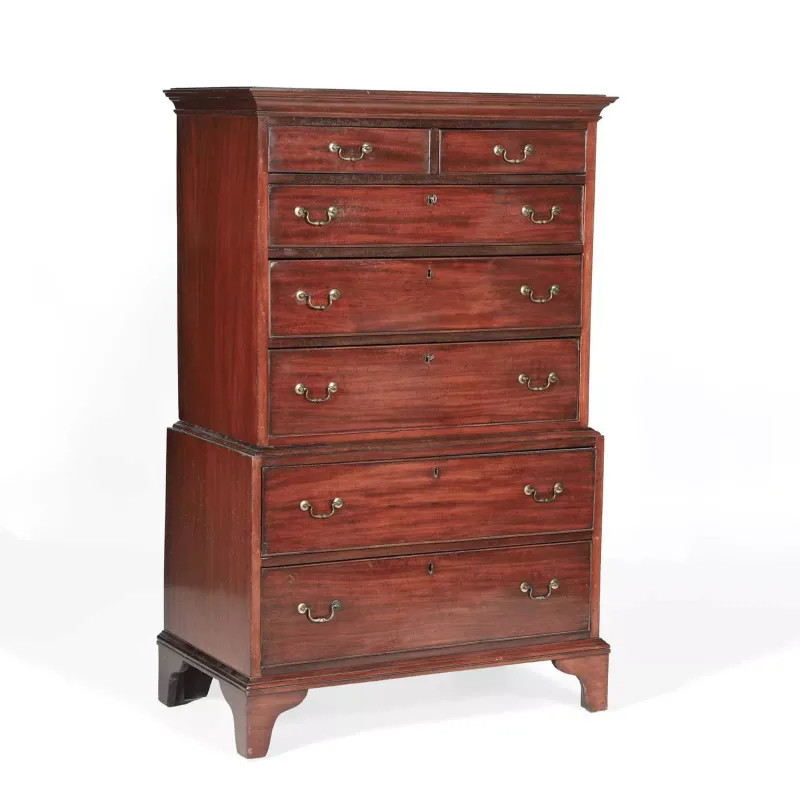 A George III Mahogany Chest On Chest Of Small Proportions the moulded cornice above two short and three long graduated drawers