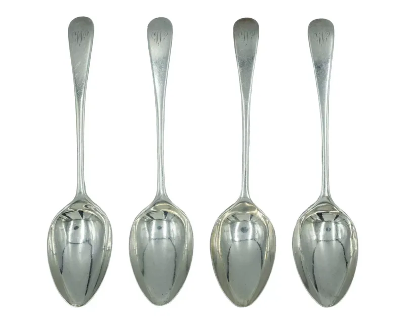 A set of four silver Old English pattern teaspoons by Walker & Hall