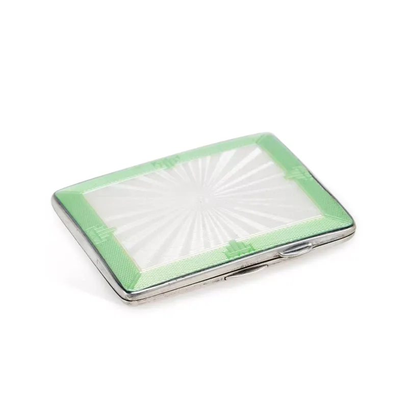 An Art Deco Silver And Enamel Cigarette Case by Joseph Gloster Ltd., Birmingham 1938, of rounded rectangular form