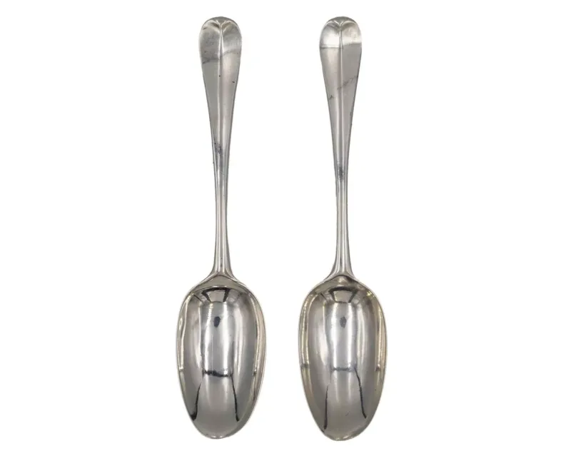 A pair of George II silver Hanoverian pattern tablespoons by Isaac Ribouleau