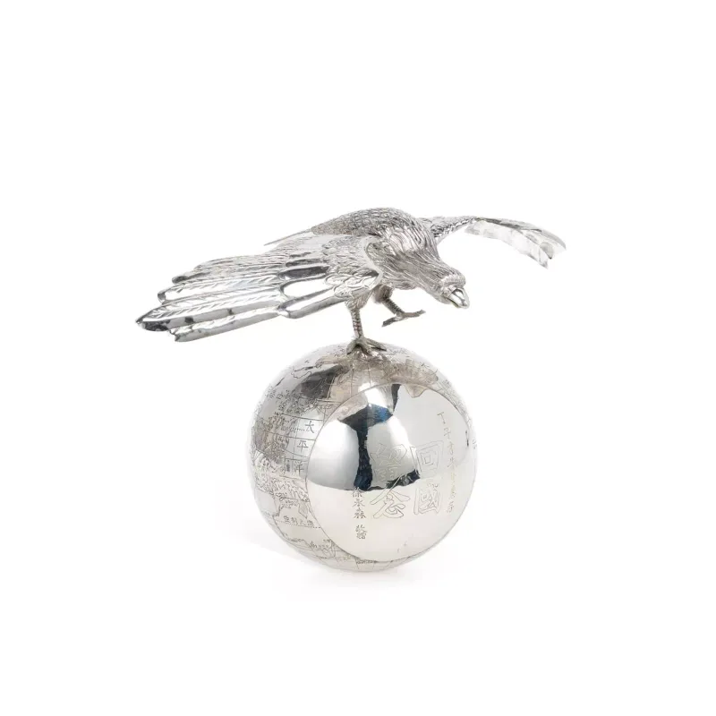 A Chinese Export Silver Model Of A Globe early 20th Century, possibly for a trophy, the sphere engraved with lines of longitude and latitude