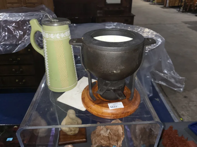A Vintage Digsmed Denmark cast iron fondue set 60s/70s with stand and burner on a teak wood base