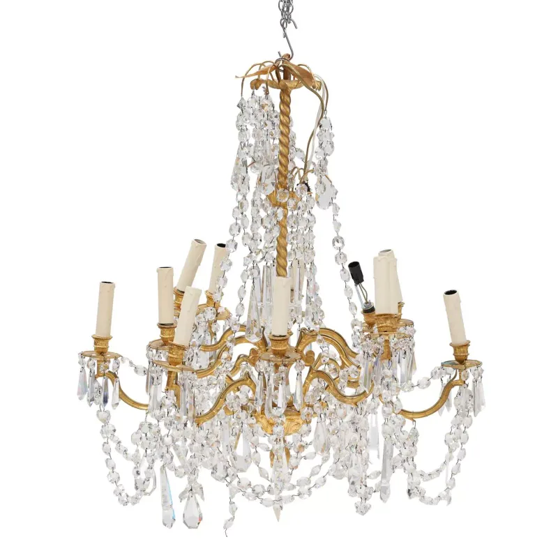 A French Gilt Metal And Cut Glass Twelve-Light Chandelier early 20th Century, in the Louis XV taste