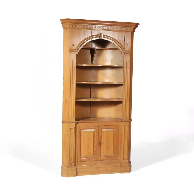 A Pine Floor Standing Corner Cabinet the dentil cornice above an arched recess with four shaped shelves flanked by fluted pilasters