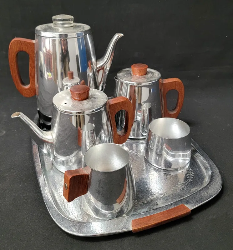 Mid Century Sona Chrome And Stainless Steel Coffee And Tea Service with large coffee pot, hot water pot, teapot, a creamer jug