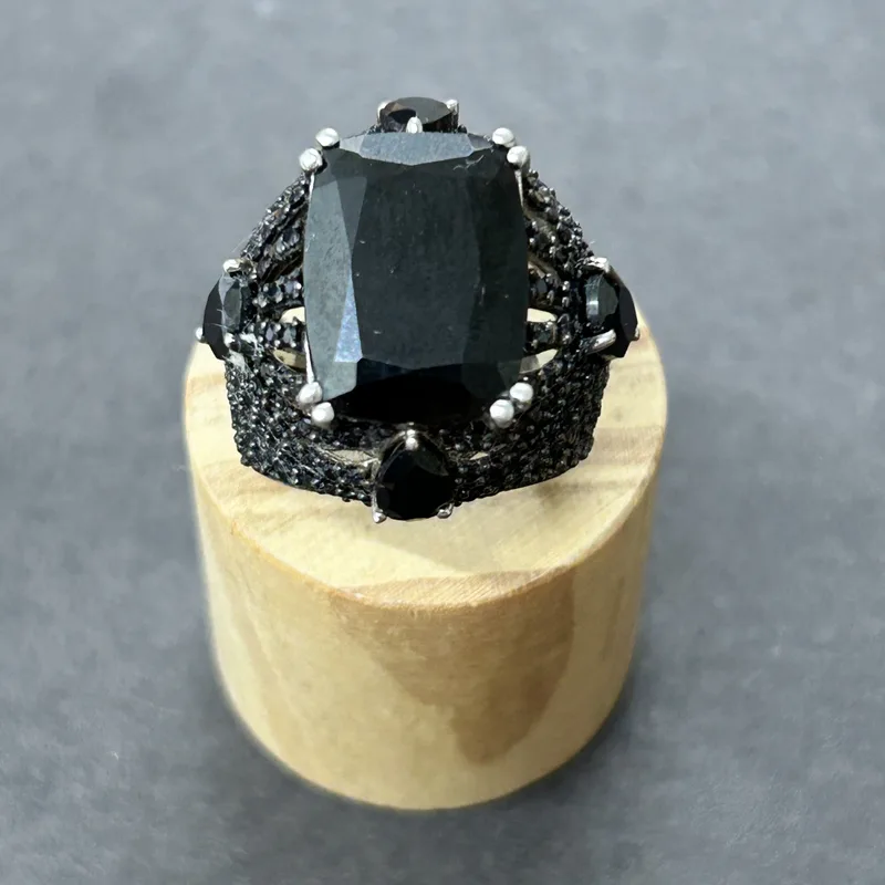 A large 925 sterling silver and stone set ring, approx. size O, weight approx. 12g