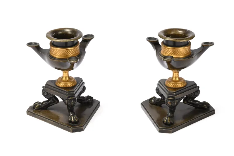 A Pair of Regency Ormolu and Patinated Classical Revival Bronze Candlesticks, Circa 1810