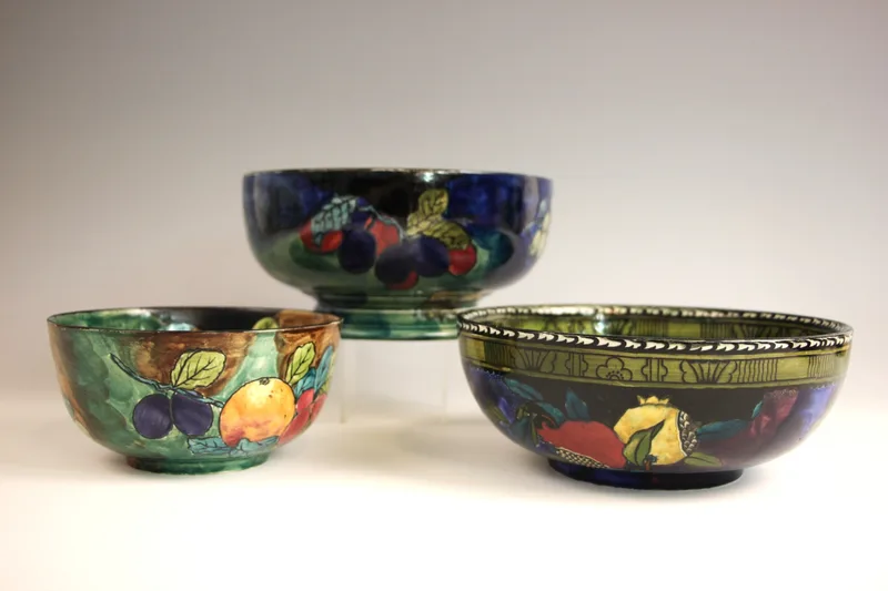 Three bowls by F X Abraham for S Hancock & Son, comrpising: a Jilian Ware footed bowl decorated with fruit,