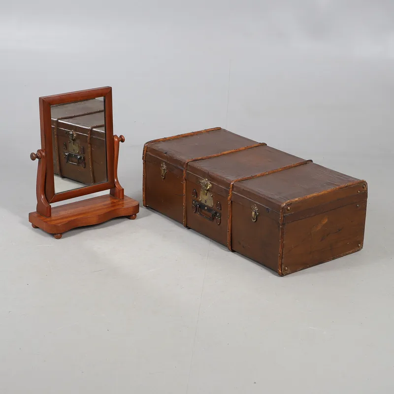 A Small Early 20th Century Canvas Trunk, and a Mahogany Dressing Table Mirror