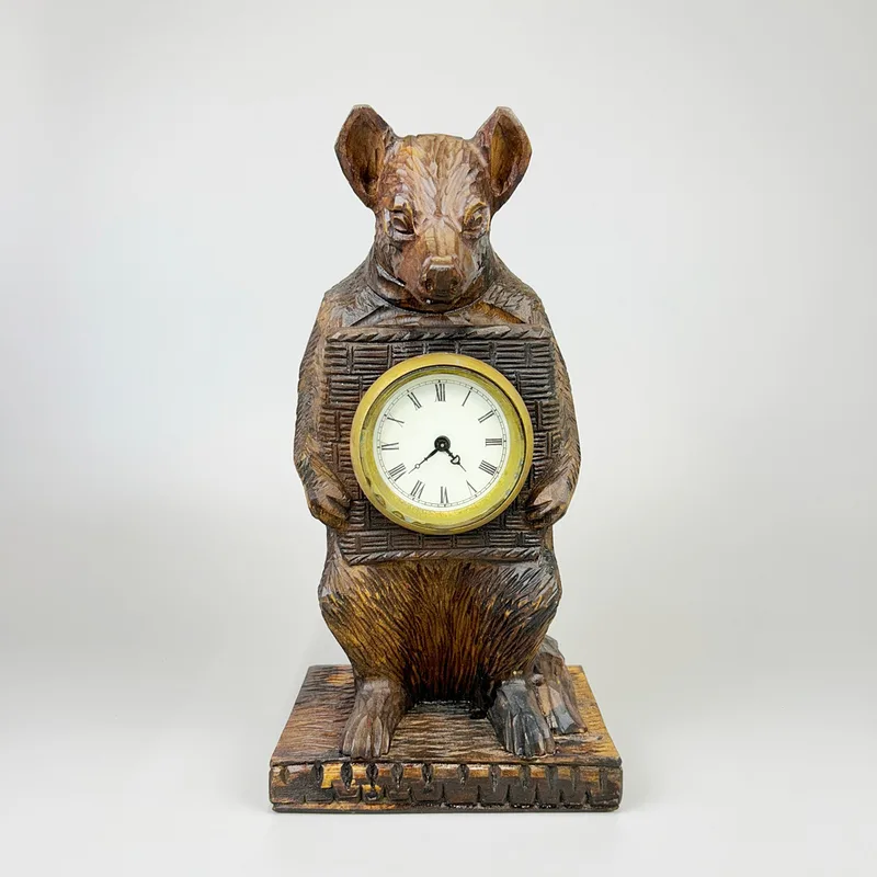 A Black Forest style clock, H. 30cm, base size 15 x 11cm