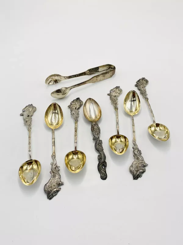 A set of six Chinese white metal spoons; together with other items of silver