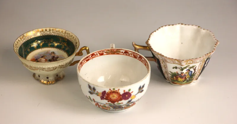 A Meissen Marcolini period porcelain teacup decorated in the 'Tischchenmuster' pattern, underglaze blue crossed swords and star to base,