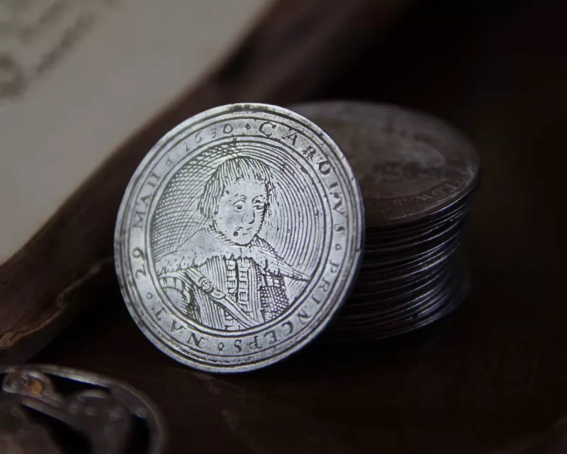 A Charles I silver counter box containing thirty silver counters