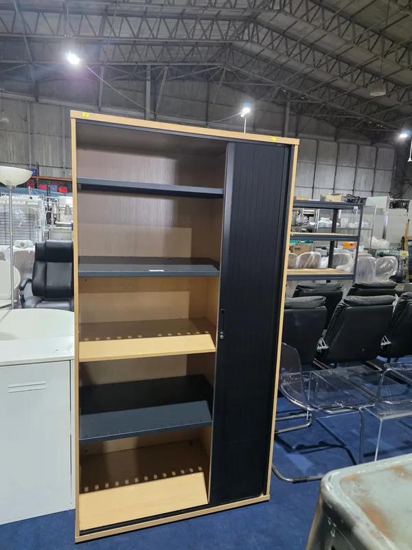 A tall light wood effect black tambour door office cabinet approx 100*60*190cm