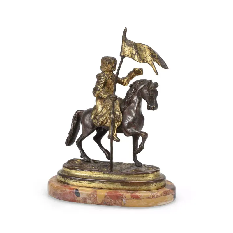 A Gilt And Patinated Bronze Equestrian Figure Joan Of Arc French, late 19th Century, the gilt figure modelled upon a walking horse in patinated bronze