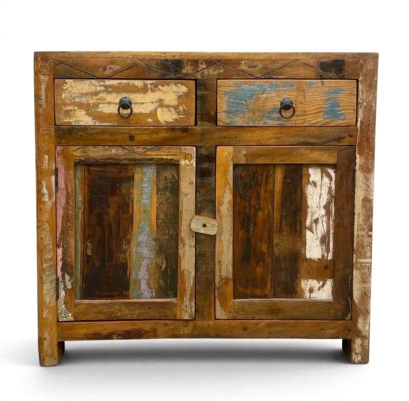A contemporary rustic sideboard with two frieze drawers over two panel doors with a painted and distressed polychrome finish raised on stile supports