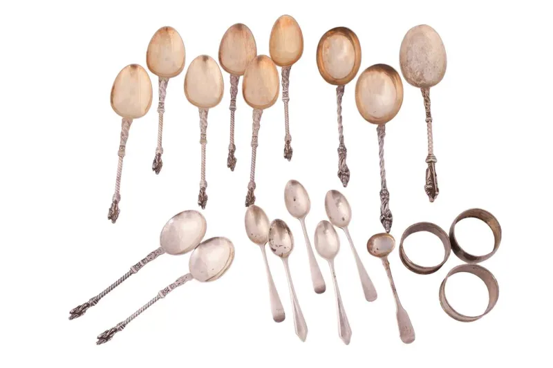 A collection of assorted loose silver spoons and napkin rings, to include spoons by Martin, Hall & Co (Richard Martin & Ebenezer Hall), Sheffield 1876