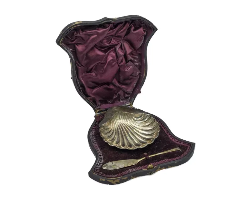 A Victorian silver scallop butter dish set by Martin