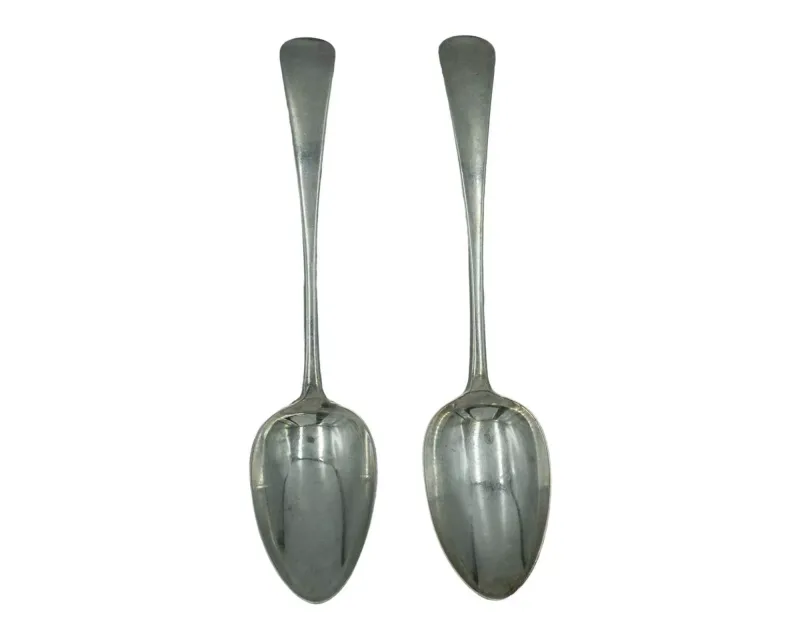 A pair of George IV silver Old-English pattern table spoons by James Beebe