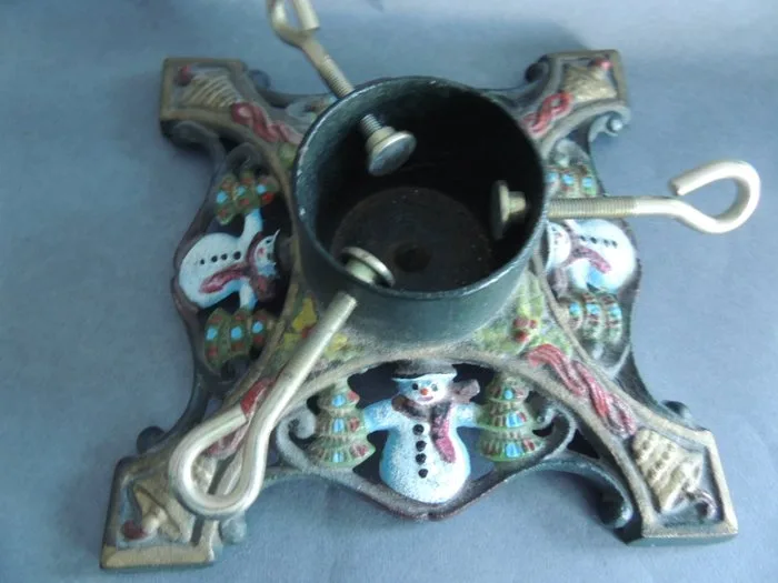 Stand - For the Christmas and New Year holidays, a very handsome cast-iron stand for the base of the