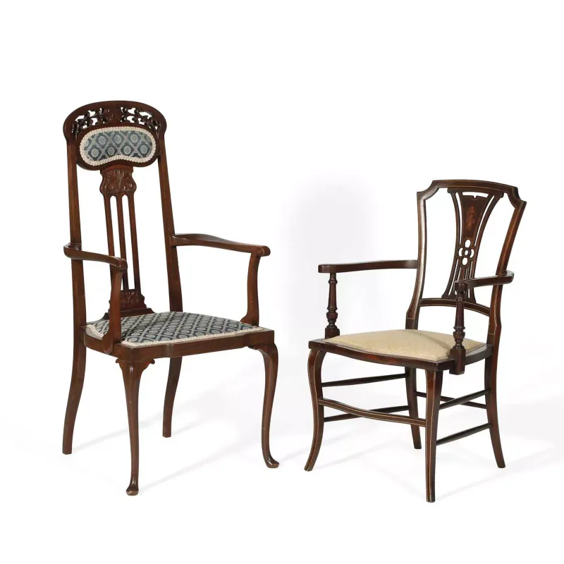 Two Edwardian Mahogany Chairs comprising an Art Nouveau armchair with a pierced and inlaid back above an upholstered seat, and an inlaid salon chair