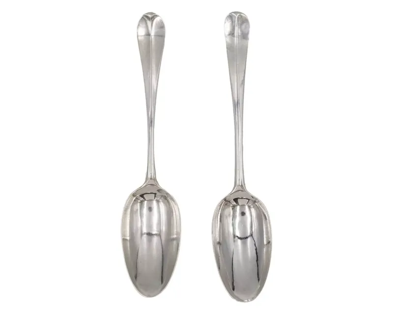 A pair of George II silver Hanoverian pattern table spoons by James Wilks