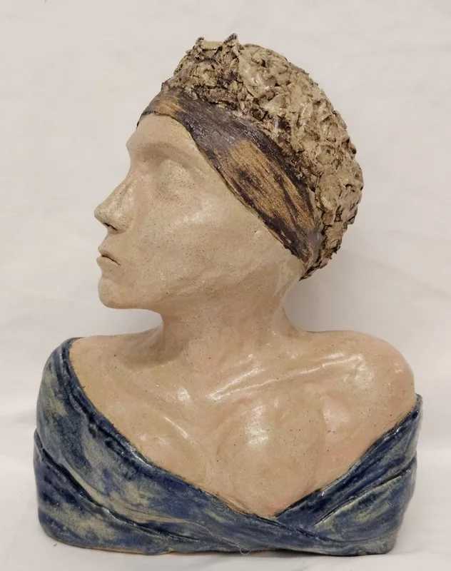 Studio Pottery Stoneware Bust of a woman marked SB to base approx.