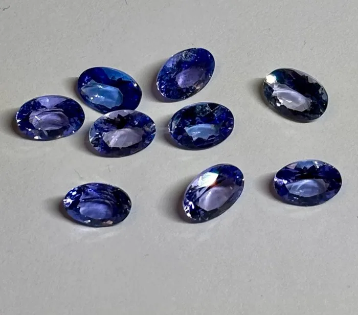 9 pcs Blue, Purple Tanzanite - 7.01 ct - Antwerp Laboratory for Gemstone Testing (ALGT)