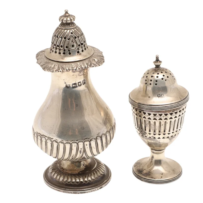 A Silver Vase Shaped Muffineer and a Silver Pepper