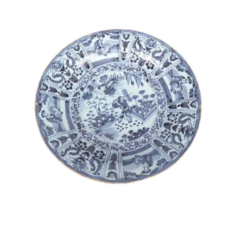 A Dutch Delft Charger circa 1660, painted in blue in the Chinese kraak manner