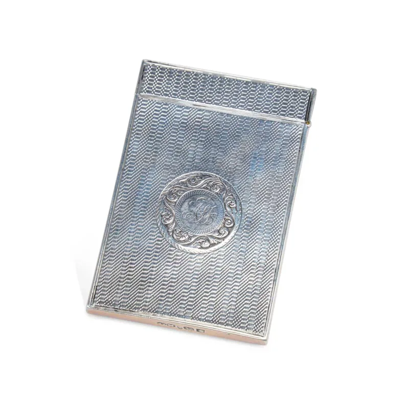 A George IV Silver Card Case by Taylor & Perry, Birmingham 1829, of rectangular form with a hinged cover, engine-turned decoration