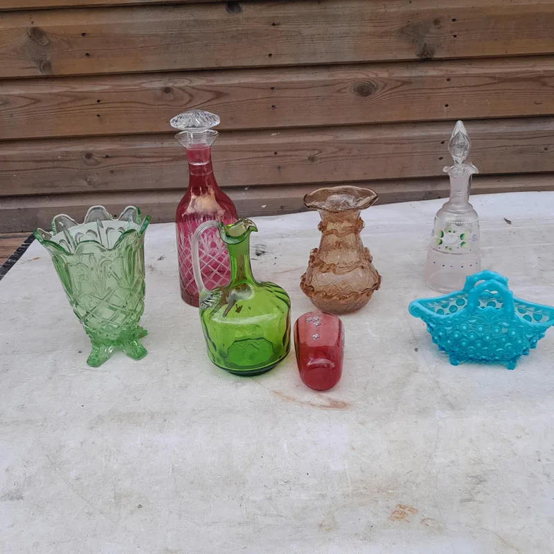 Various era coloured and clear glass items, Bohemian cut coloured glass decanter