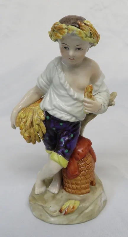 Antique Porcelain Figurine The Four Seasons Series entitled 'Summer', small boy wearing a wreath made from wheat in his hair approx.