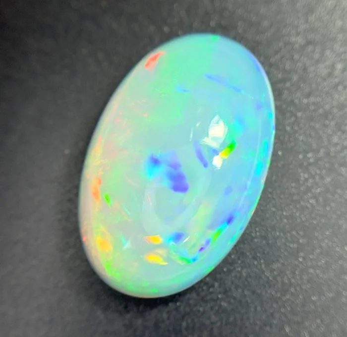 1 pcs Orange Opal - 11.49 ct - International Gemological Institute (IGI) - NATURAL COLOR PLAY OPAL