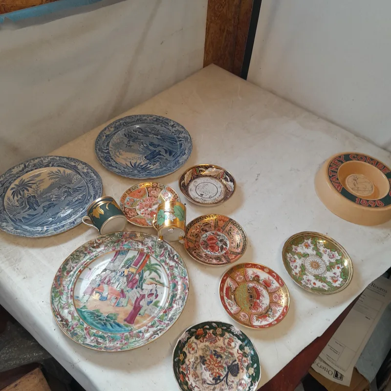 Mixed era ceramics : Chinese Famille Rose plate with early restoration, Crown Derby Saucers, 19th century blue and white transfer, note some damage