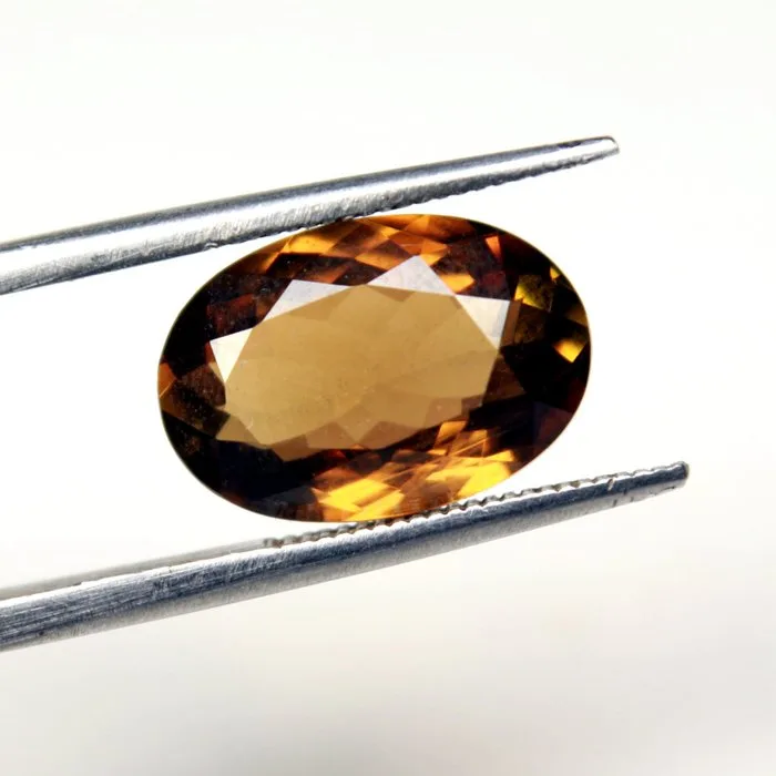 1 pcs Brown, Yellow Enstatite - 7.13 ct - International Gemological Institute (IGI) - A Rare Gem